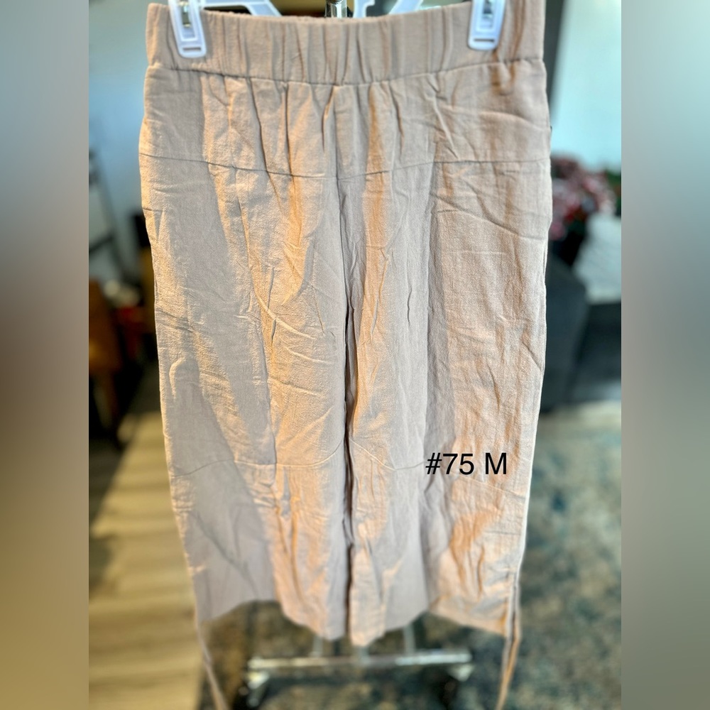 Tan colored capri style new size M.
